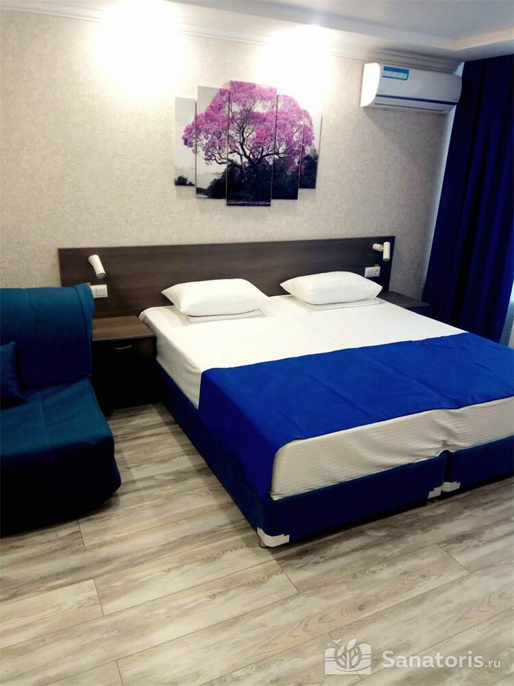 Стандарт 2х-местный Улучшенный боковой вид на море