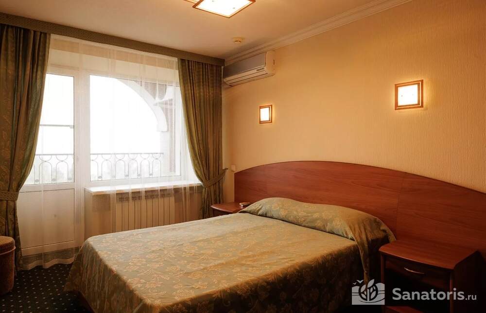 Улучшенный стандарт с двуспальной кроватью вид на море